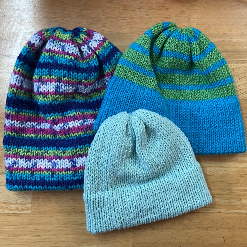 How to machine knit a reversible lace hat with a Brother punch card knitting  machine 